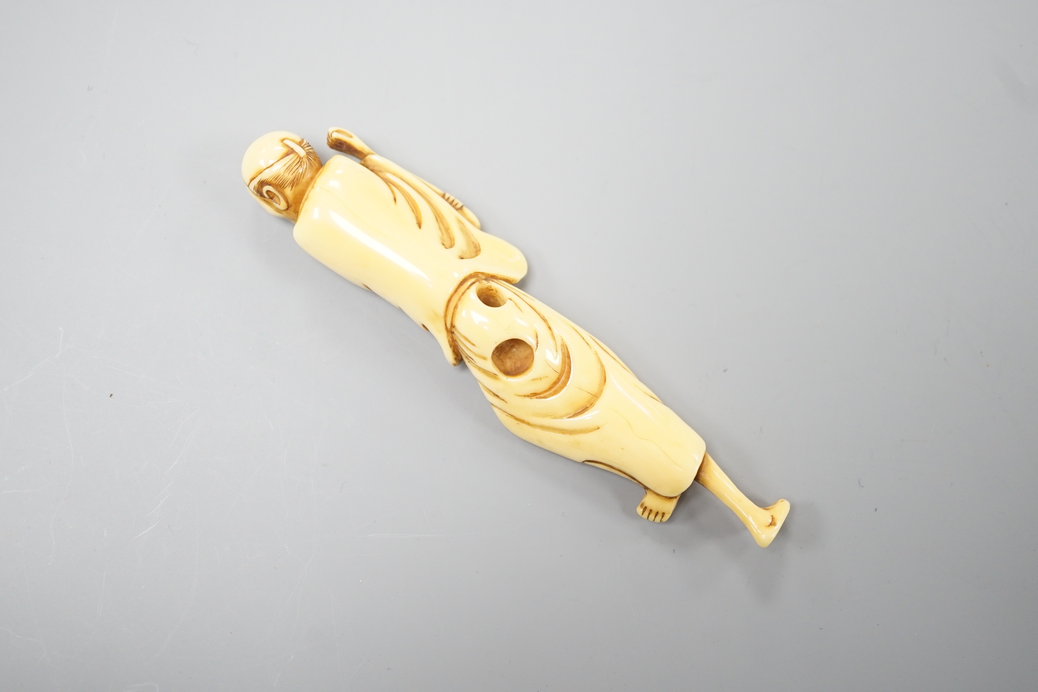 A Japanese ivory netsuke of a howling man, late 18th/early 19th century, 9.4cm